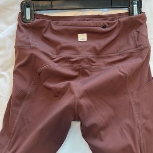 Vuori burgundy leggings with size pockets. Excellent condition. Size small